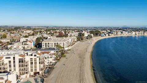 an aerial view of residential building with parking space