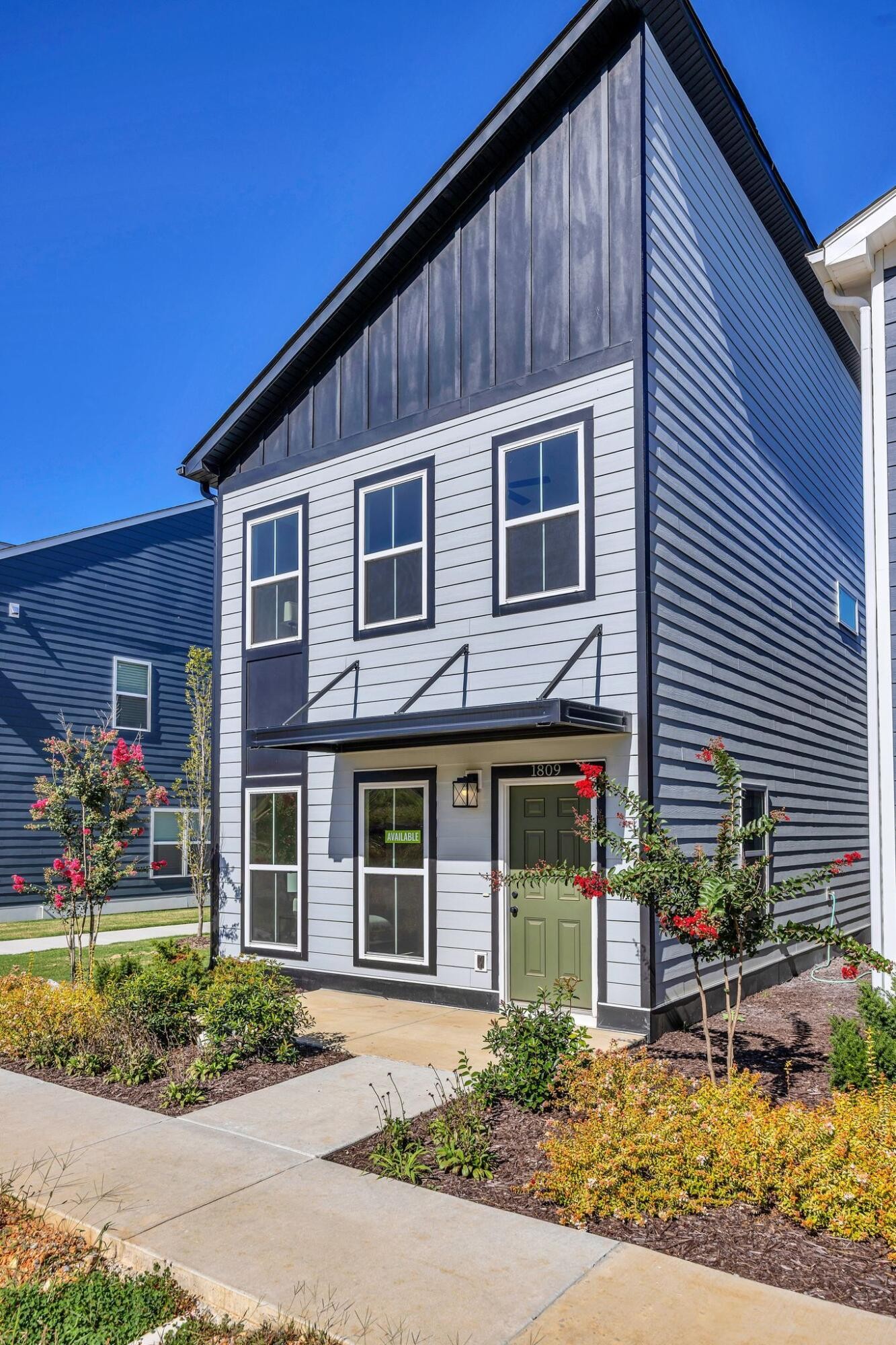 1809 Cotton Way Chattanooga, TN 37404 - Photo 2 of 27 a front view of a house with garden