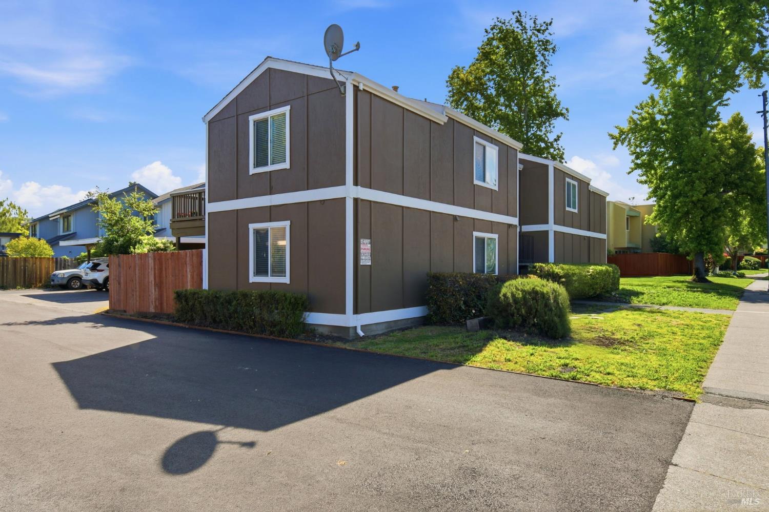2900 Yulupa Avenue Santa Rosa, CA 95405 - Photo 2 of 11 a front view of a house with a yard and garage