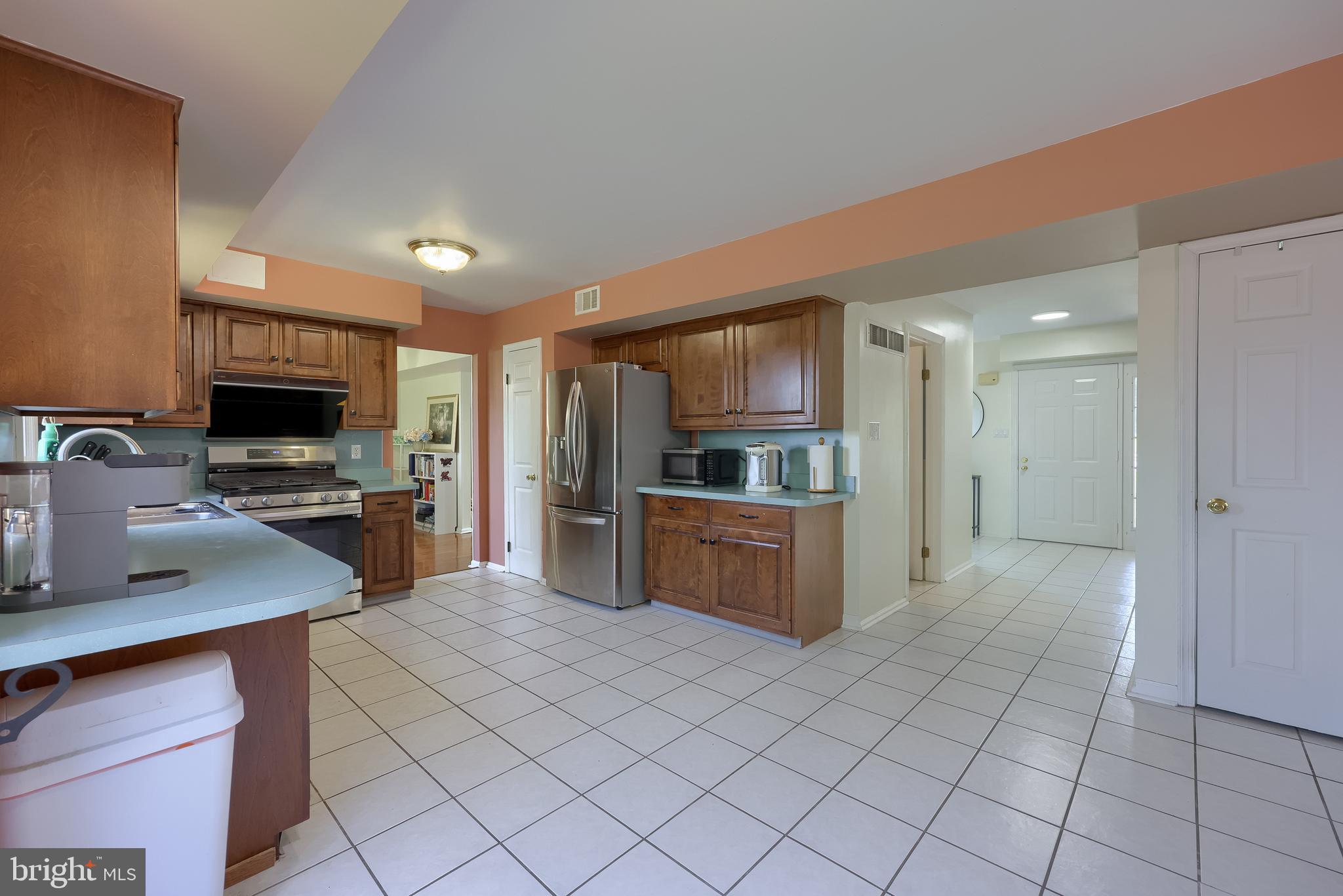 121 Sage Drive Reading, PA 19608 - Photo 15 of 47 a large kitchen with a large counter top appliances and cabinets