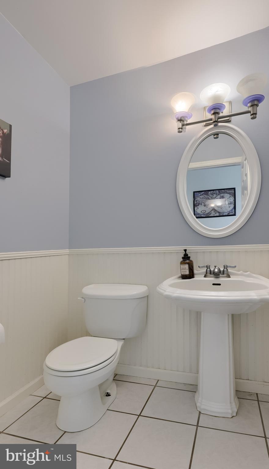 121 Sage Drive Reading, PA 19608 - Photo 24 of 47 a bathroom with a toilet a sink and mirror