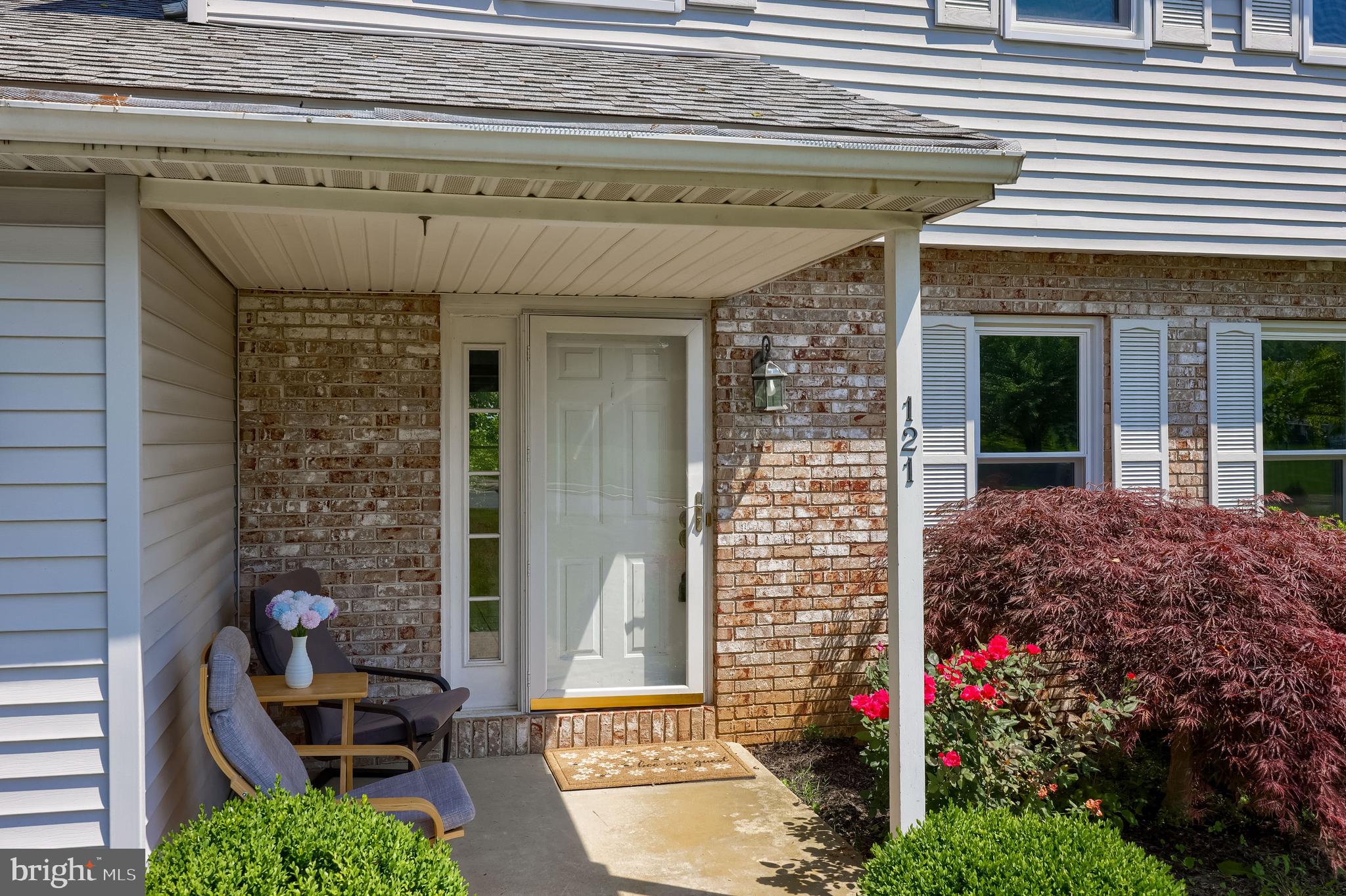 121 Sage Drive Reading, PA 19608 - Photo 3 of 47 a front view of a house with a porch