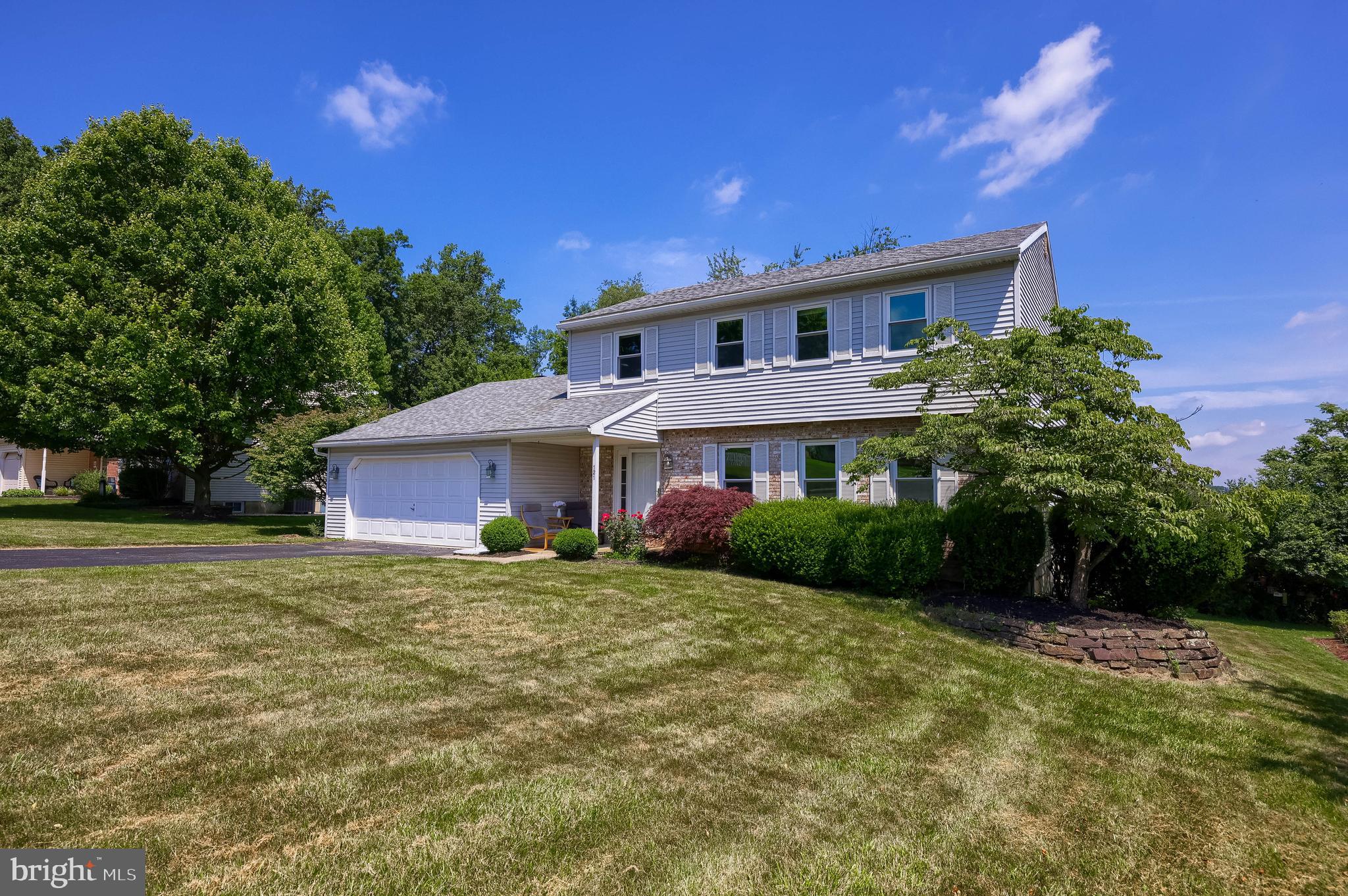 121 Sage Drive Reading, PA 19608 - Photo 42 of 47 a front view of a house with a yard