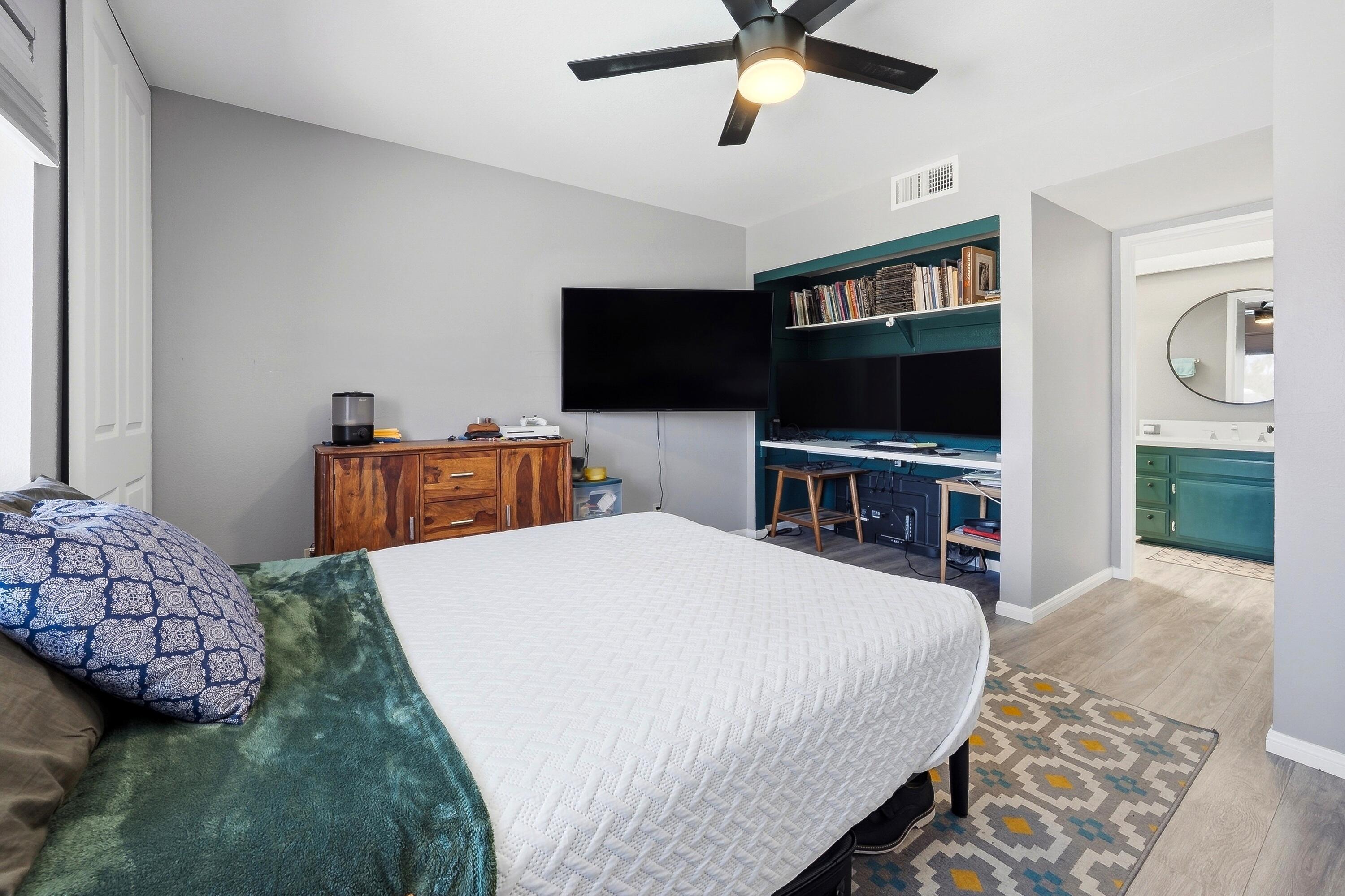 71870 Eleanora Lane Rancho Mirage, CA 92270 - Photo 17 of 36 a bedroom with a bed and a flat screen tv