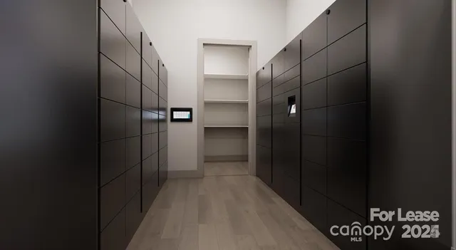 a room with wooden floor and furniture