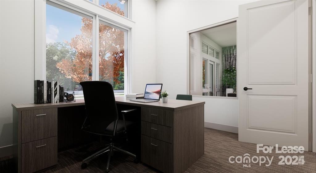 225 Rhyne Road, Unit A1 Charlotte, NC 28214 - Photo 10 of 48 a view of a workspace with furniture and a window
