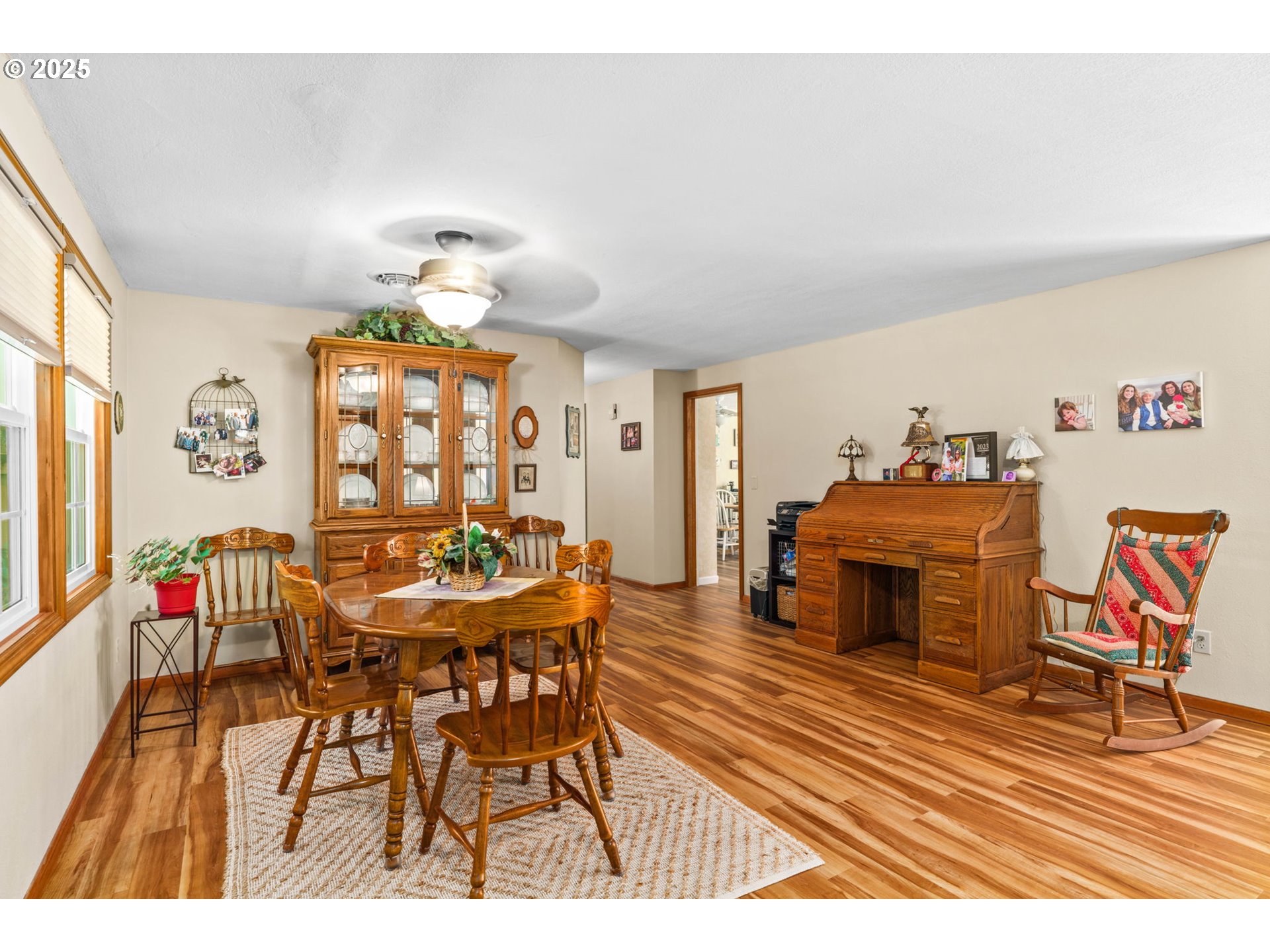 38754 Place Road Fall Creek, OR 97438 - Photo 12 of 48 a living room with furniture a dining table and a fireplace