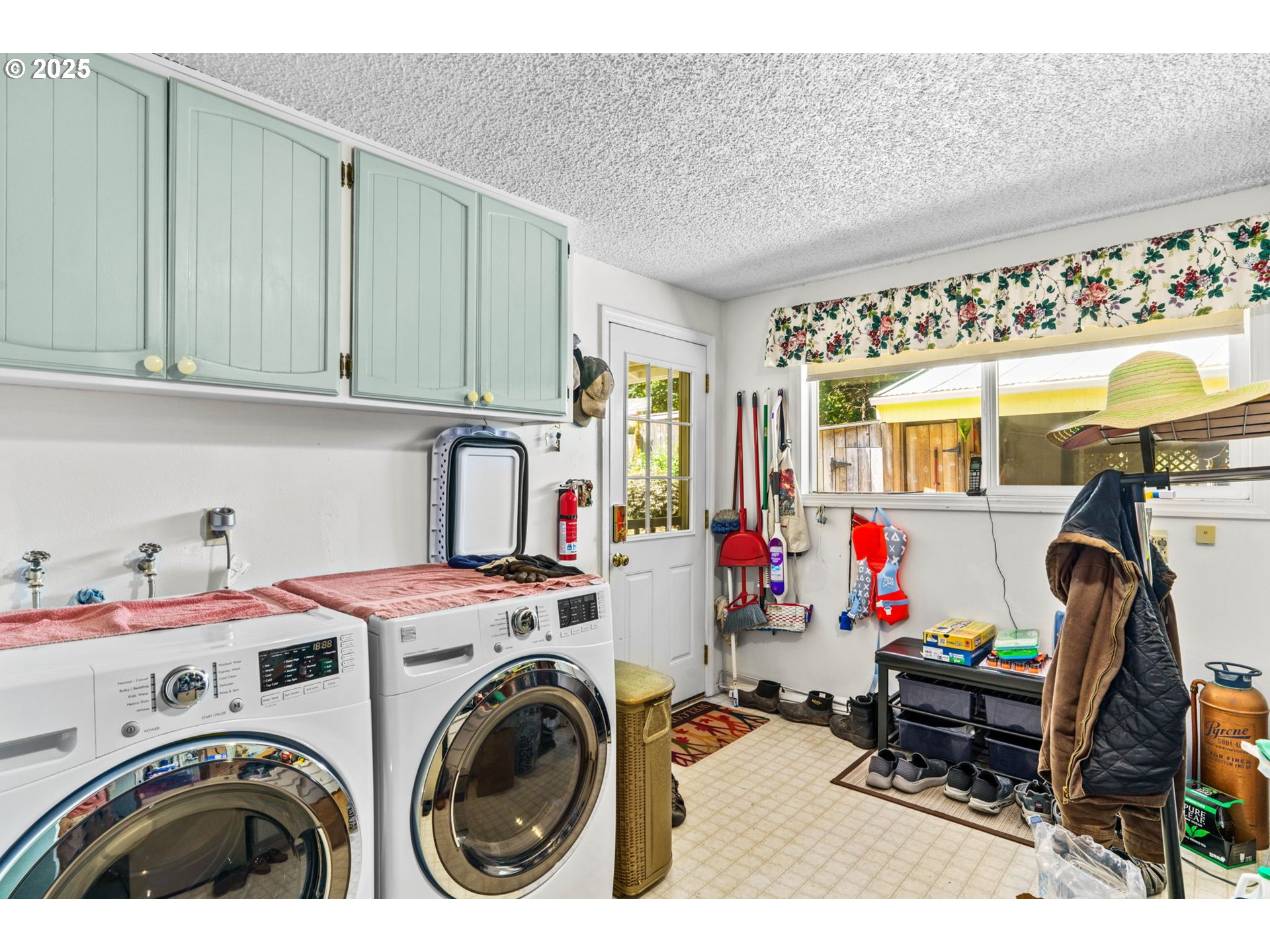 38754 Place Road Fall Creek, OR 97438 - Photo 13 of 48 a storage room with washer and dryer