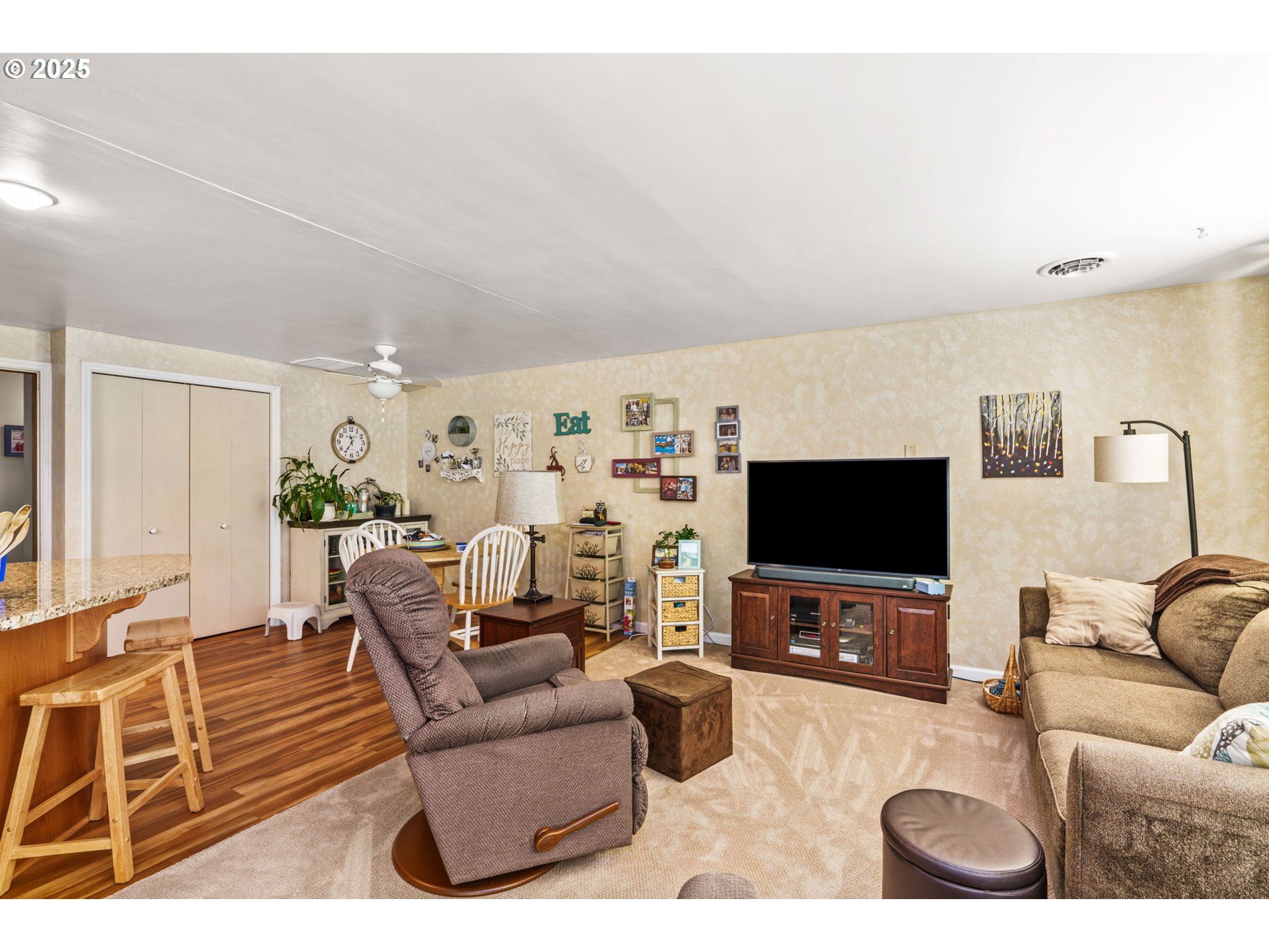 38754 Place Road Fall Creek, OR 97438 - Photo 17 of 48 a living room with furniture and a flat screen tv