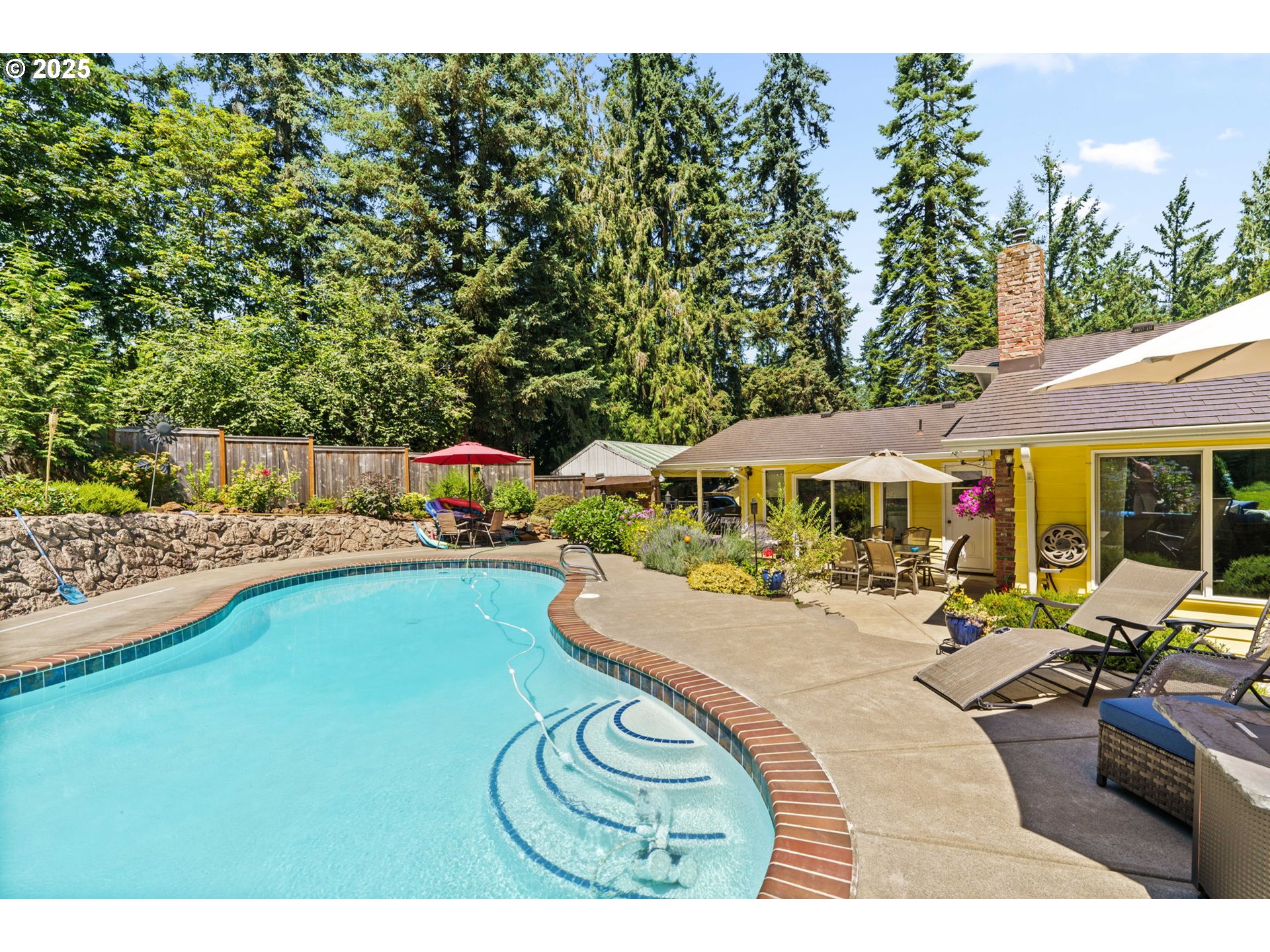 38754 Place Road Fall Creek, OR 97438 - Photo 35 of 48 a swimming pool view with a seating space