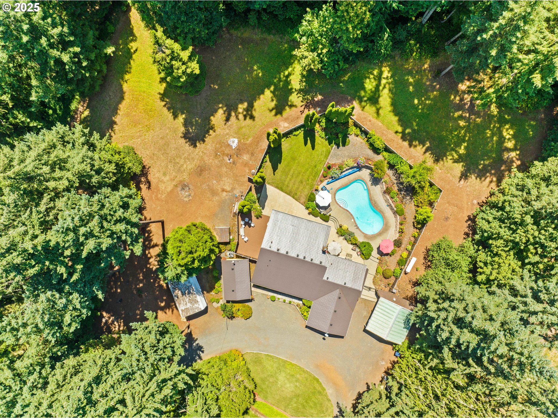 38754 Place Road Fall Creek, OR 97438 - Photo 39 of 48 an aerial view of residential house with swimming pool and lawn chairs
