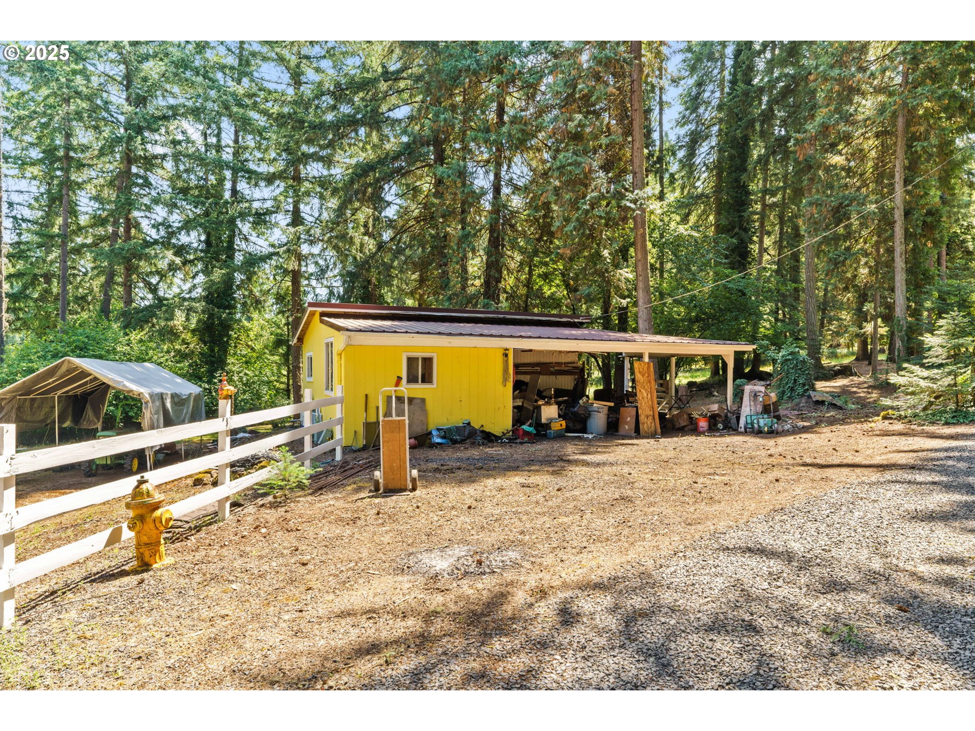 38754 Place Road Fall Creek, OR 97438 - Photo 47 of 48 a view of a house with backyard and sitting area