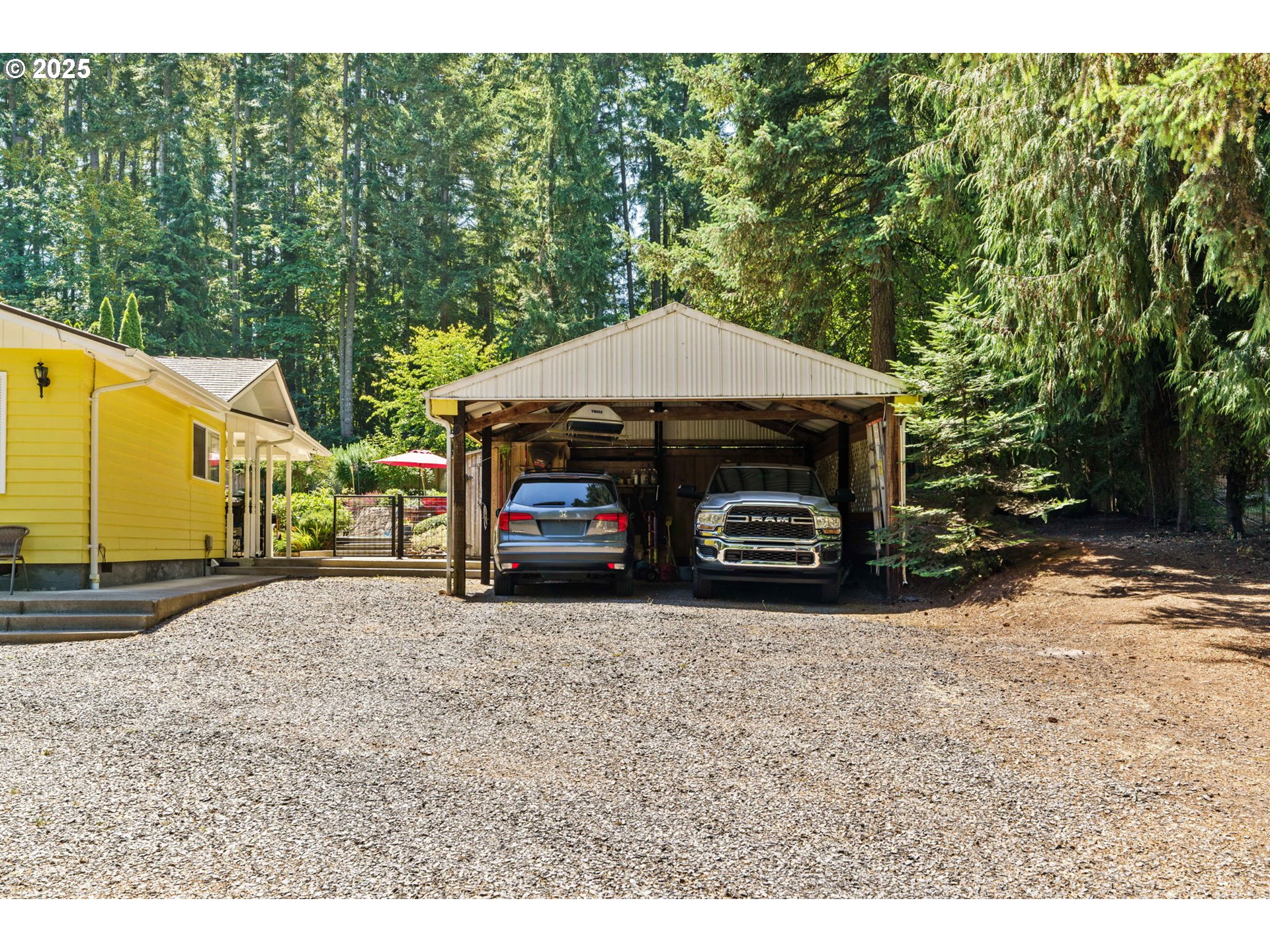 38754 Place Road Fall Creek, OR 97438 - Photo 5 of 48 a view of a car parked in front of a house