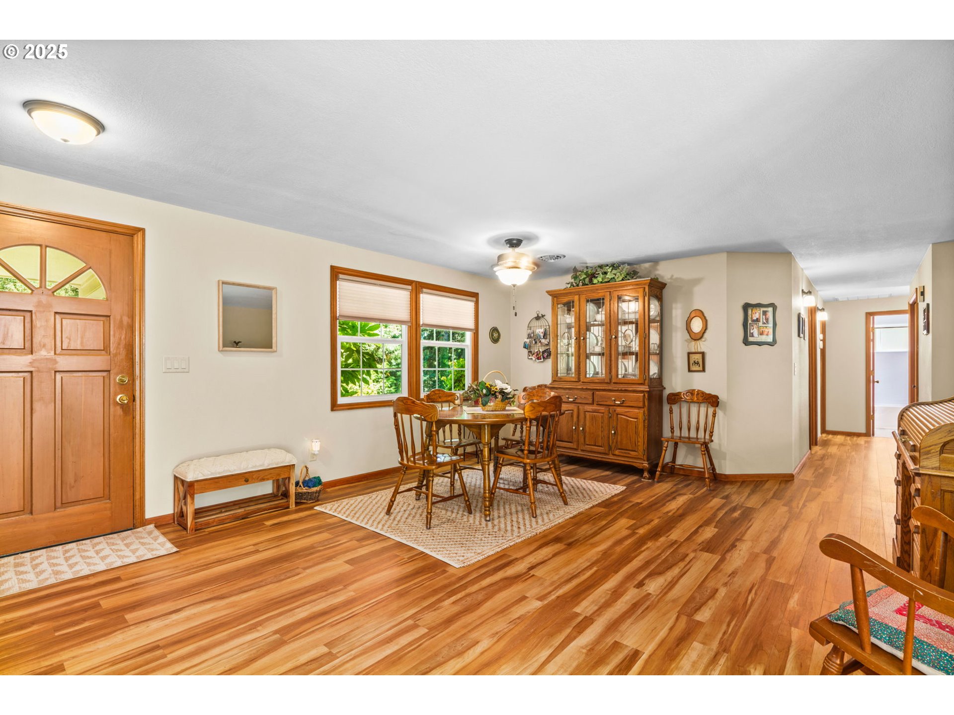 38754 Place Road Fall Creek, OR 97438 - Photo 8 of 48 a living room with furniture a wooden floor and next to a window