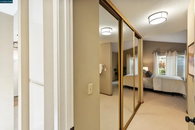a en suite bathroom with a sink and a mirror