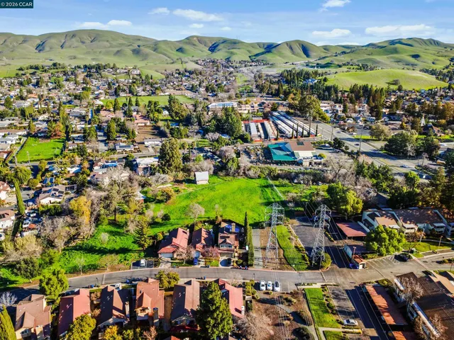 a view of a city with mountains