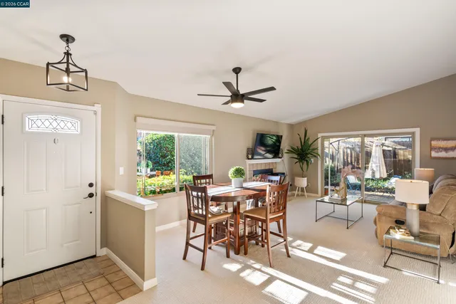 a view of a livingroom with furniture window and outside view