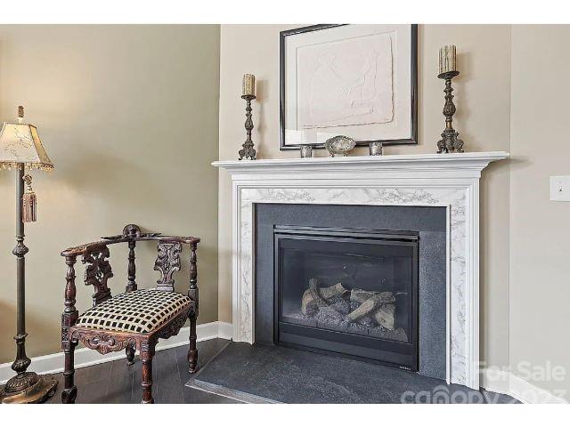 1292 Independence Street Fort Mill, SC 29708 - Photo 20 of 39 a living room with furniture and a fireplace
