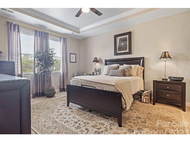1292 Independence Street Fort Mill, SC 29708 - Photo 25 of 39 a bedroom with a bed and a window