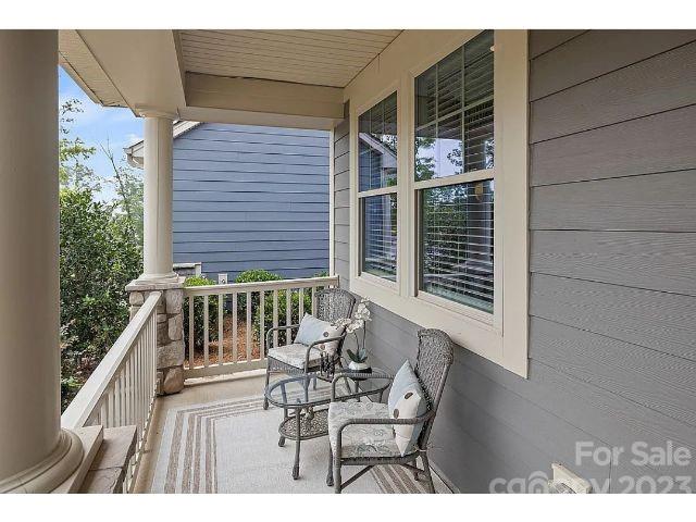 1292 Independence Street Fort Mill, SC 29708 - Photo 3 of 39 a view of balcony with two chairs and a table