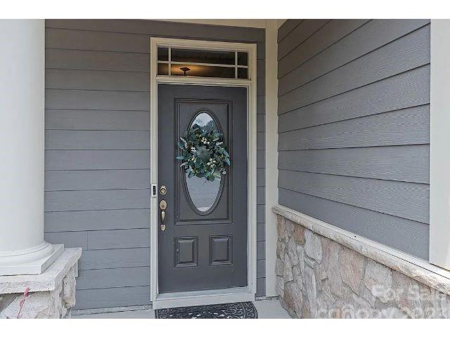 1292 Independence Street Fort Mill, SC 29708 - Photo 4 of 39 a view of entryway with wooden door