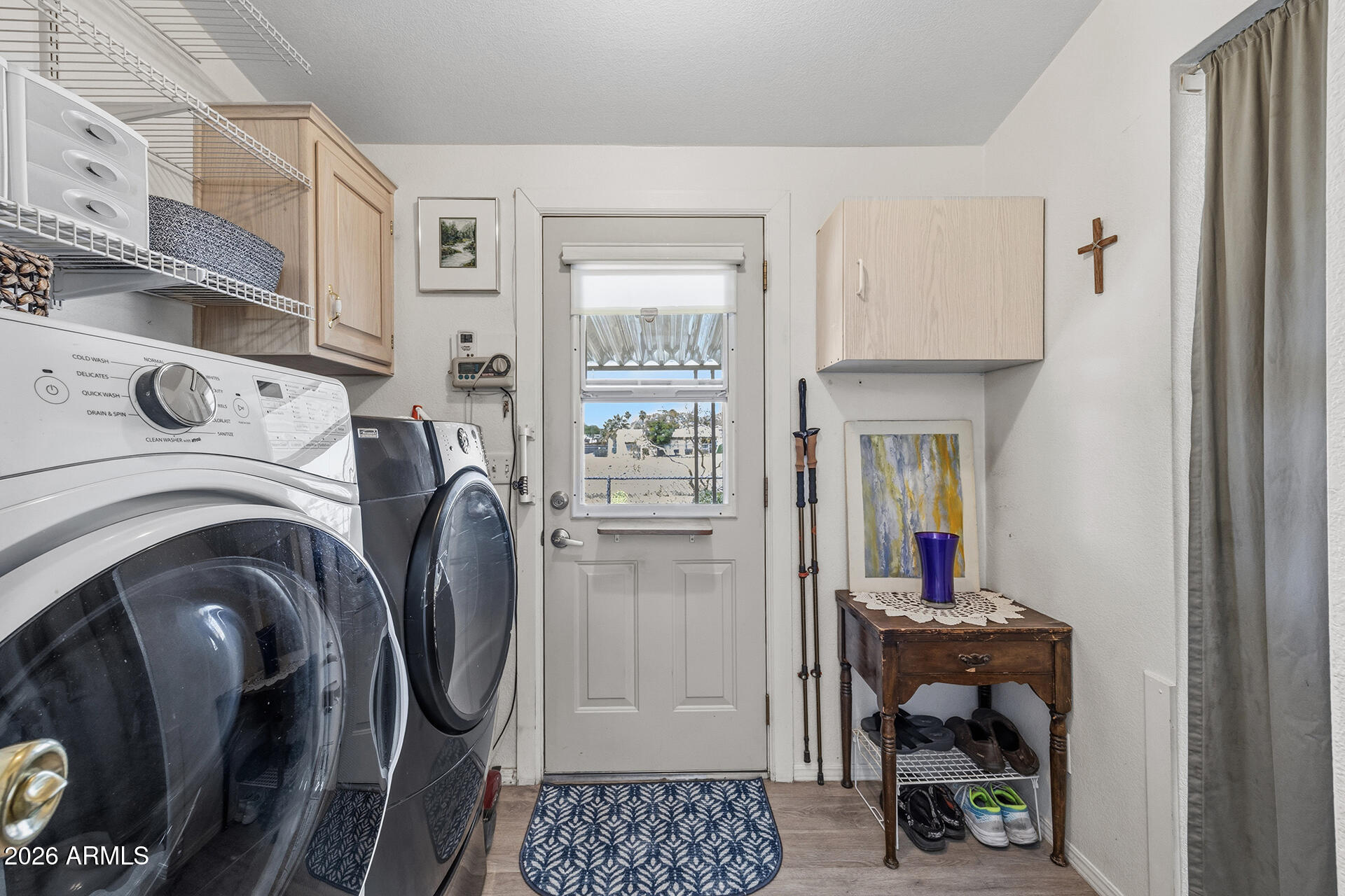 2701 East Utopia Road, Unit 153 Phoenix, AZ 85050 - Photo 18 of 26 a view of livingroom with washer and dryer