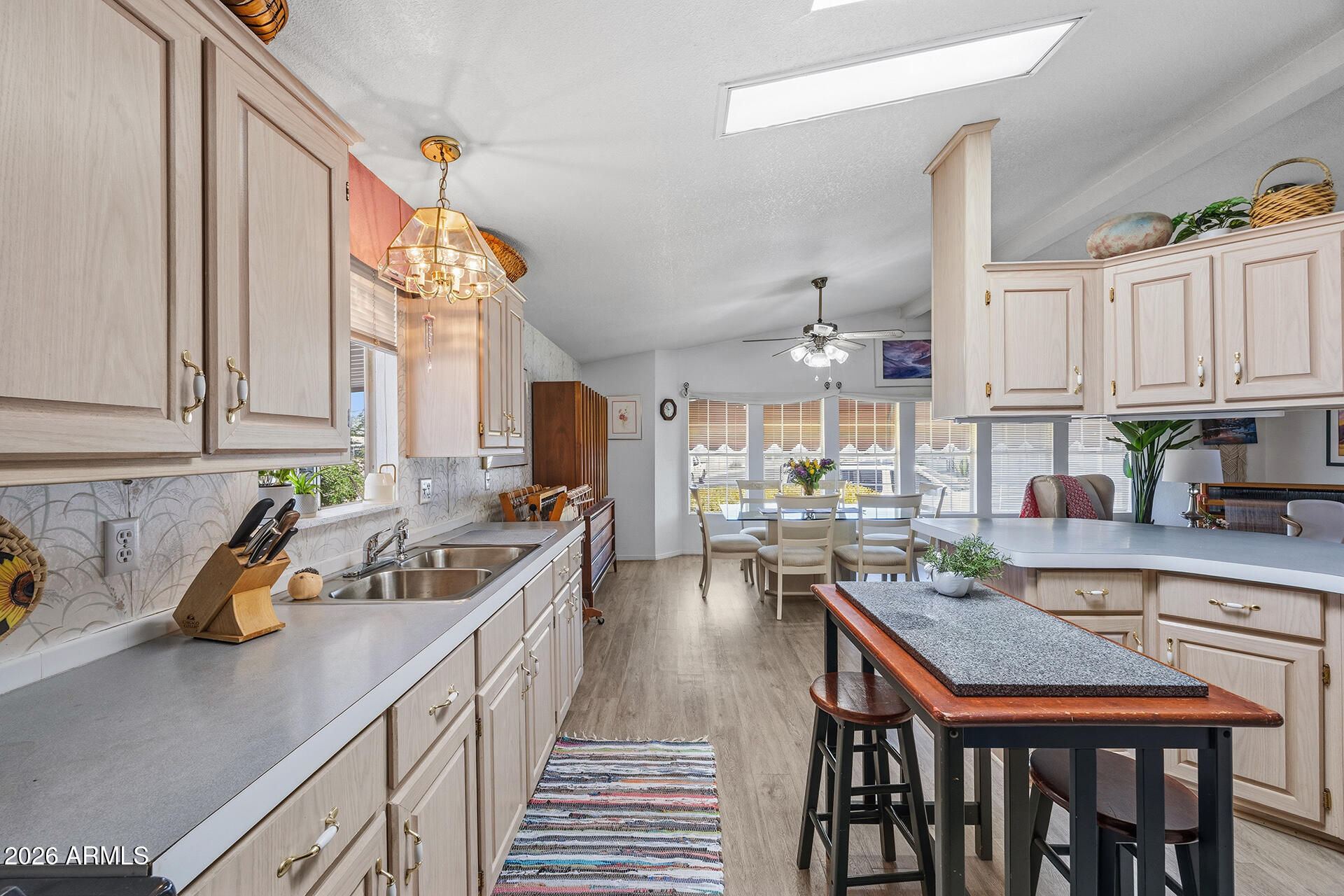 2701 East Utopia Road, Unit 153 Phoenix, AZ 85050 - Photo 4 of 26 a kitchen with lots of counter top space