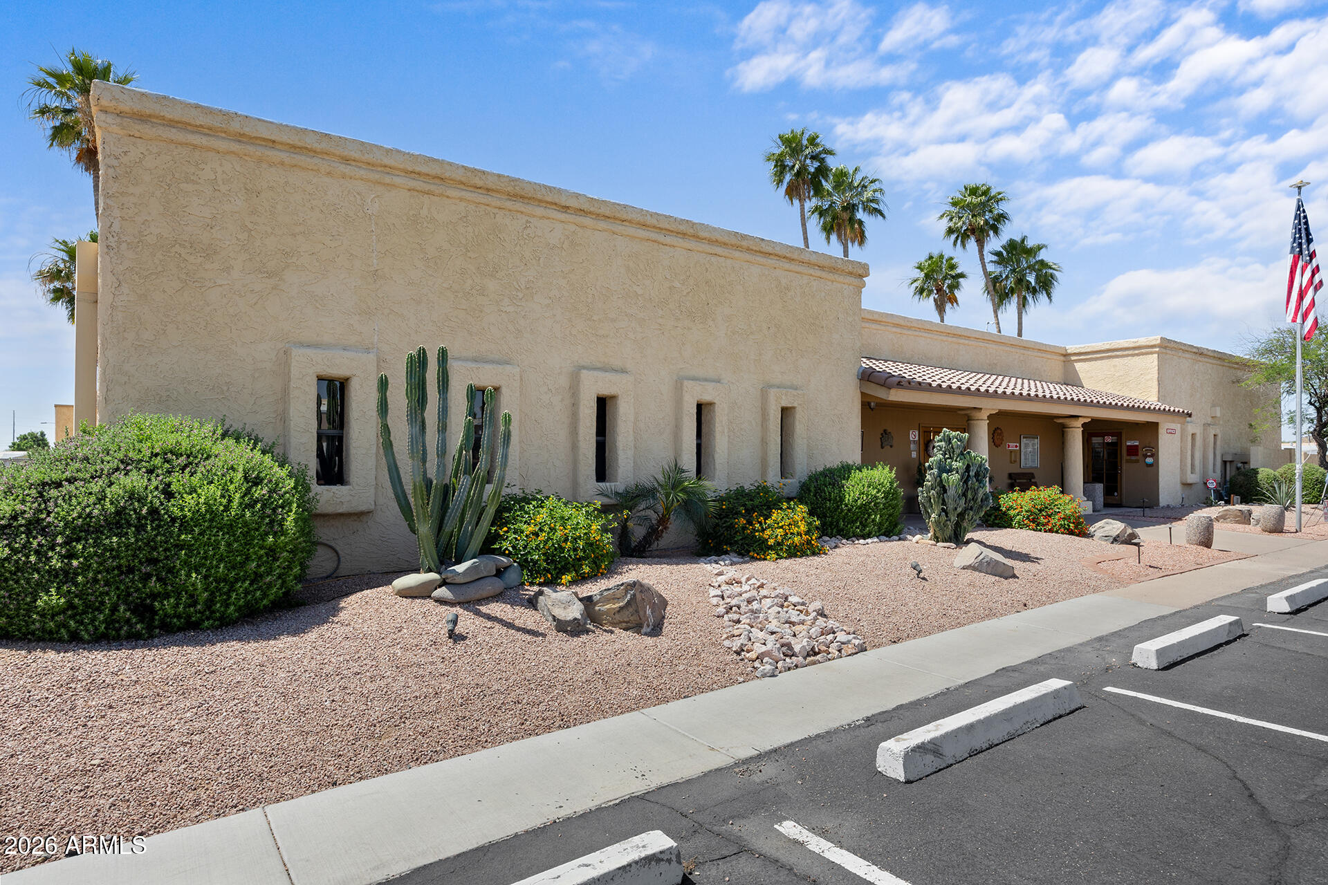 2701 East Utopia Road, Unit 153 Phoenix, AZ 85050 - Photo 6 of 26 a front view of a house with garden
