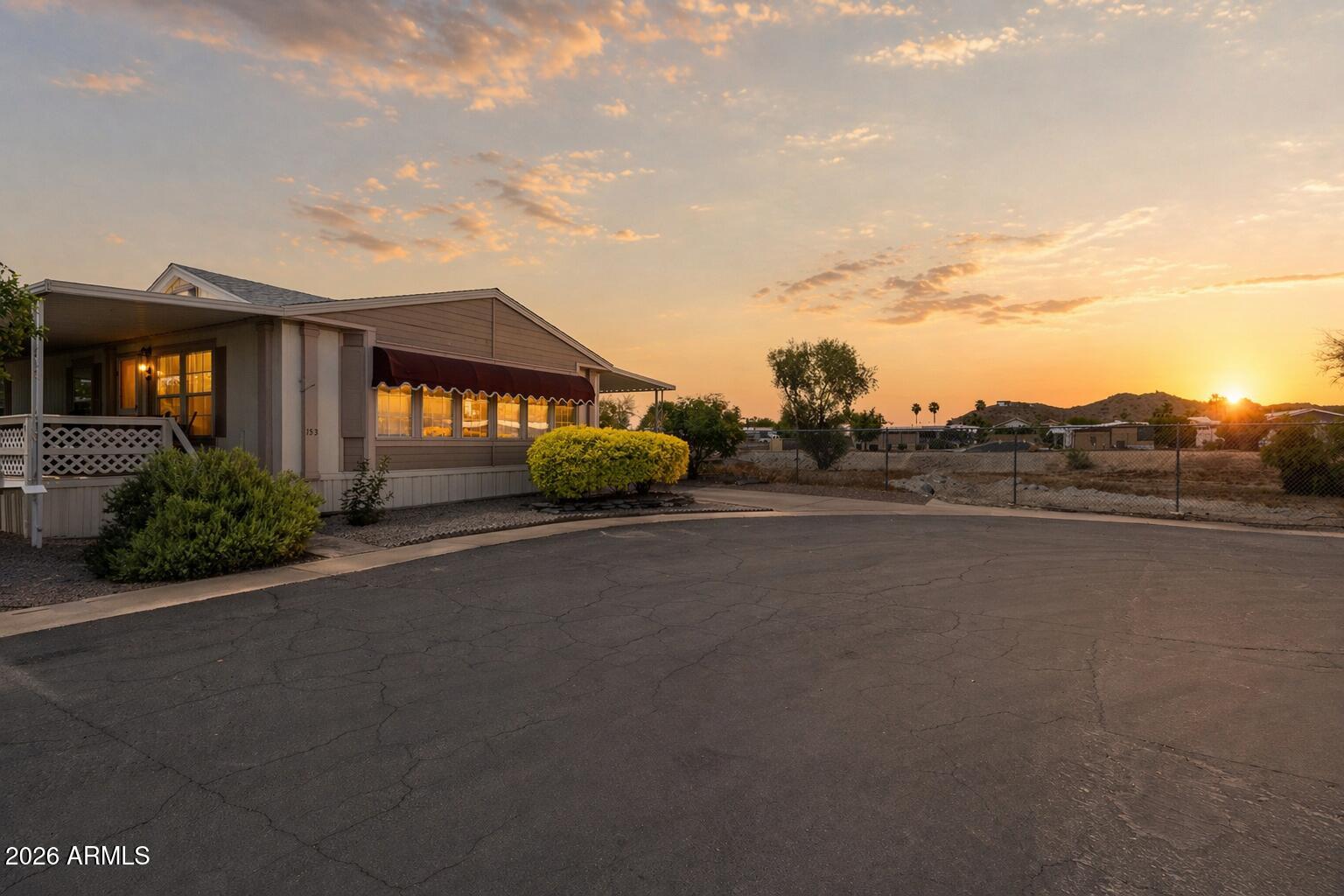 2701 East Utopia Road, Unit 153 Phoenix, AZ 85050 - Photo 7 of 26 a view of a street with a road