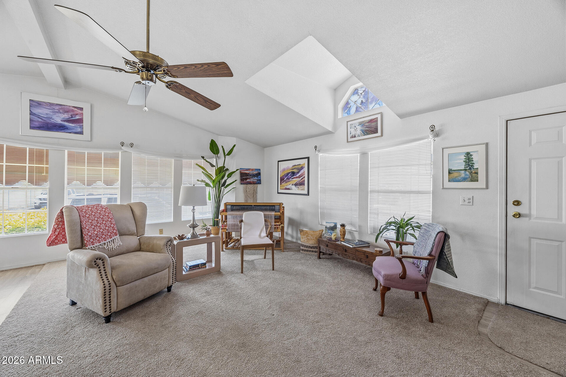 2701 East Utopia Road, Unit 153 Phoenix, AZ 85050 - Photo 10 of 26 a living room with furniture and a window