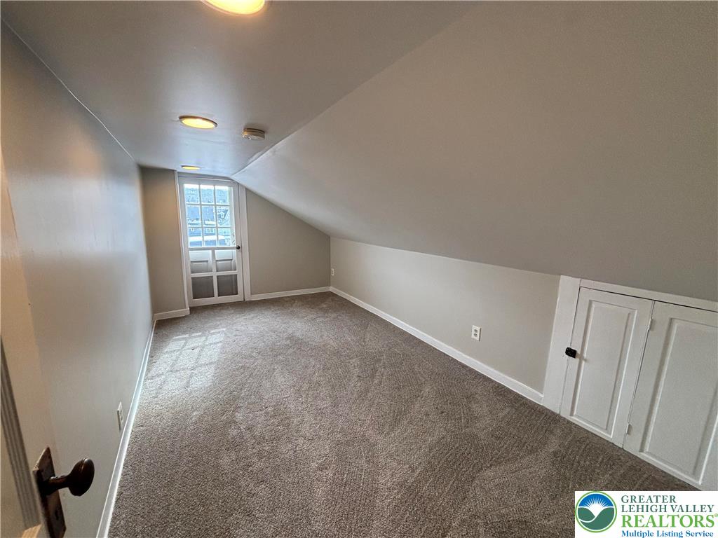 418 Ridge Street, Unit 2 Emmaus, PA 18049 - Photo 12 of 13 a view of an empty room with a window