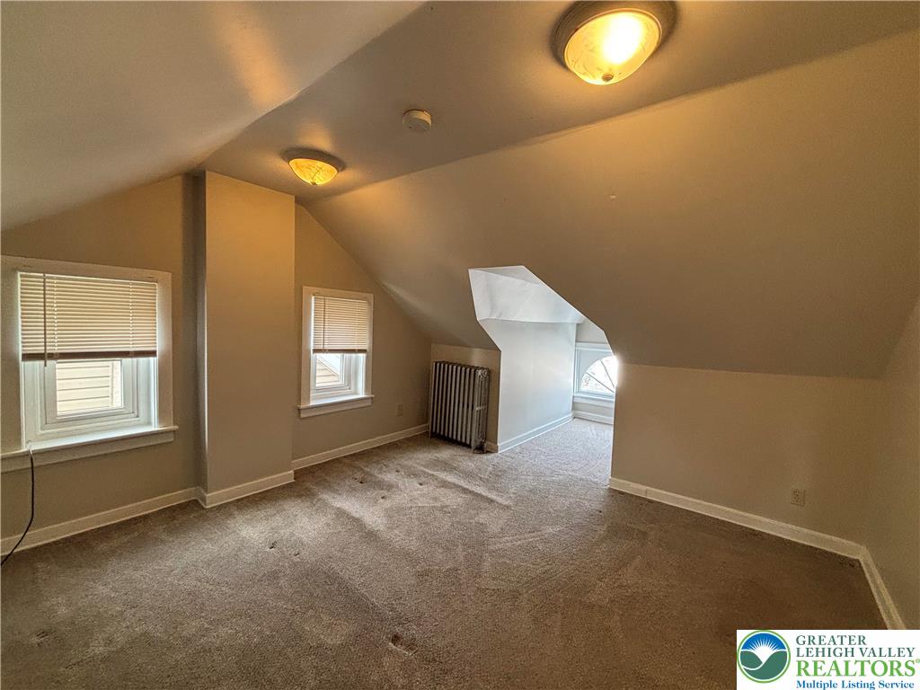 418 Ridge Street, Unit 2 Emmaus, PA 18049 - Photo 10 of 13 a view of an empty room with a window