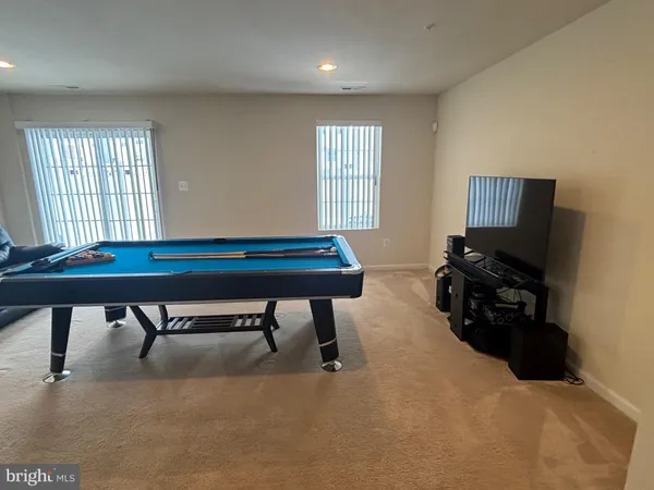 a room with furniture and a window