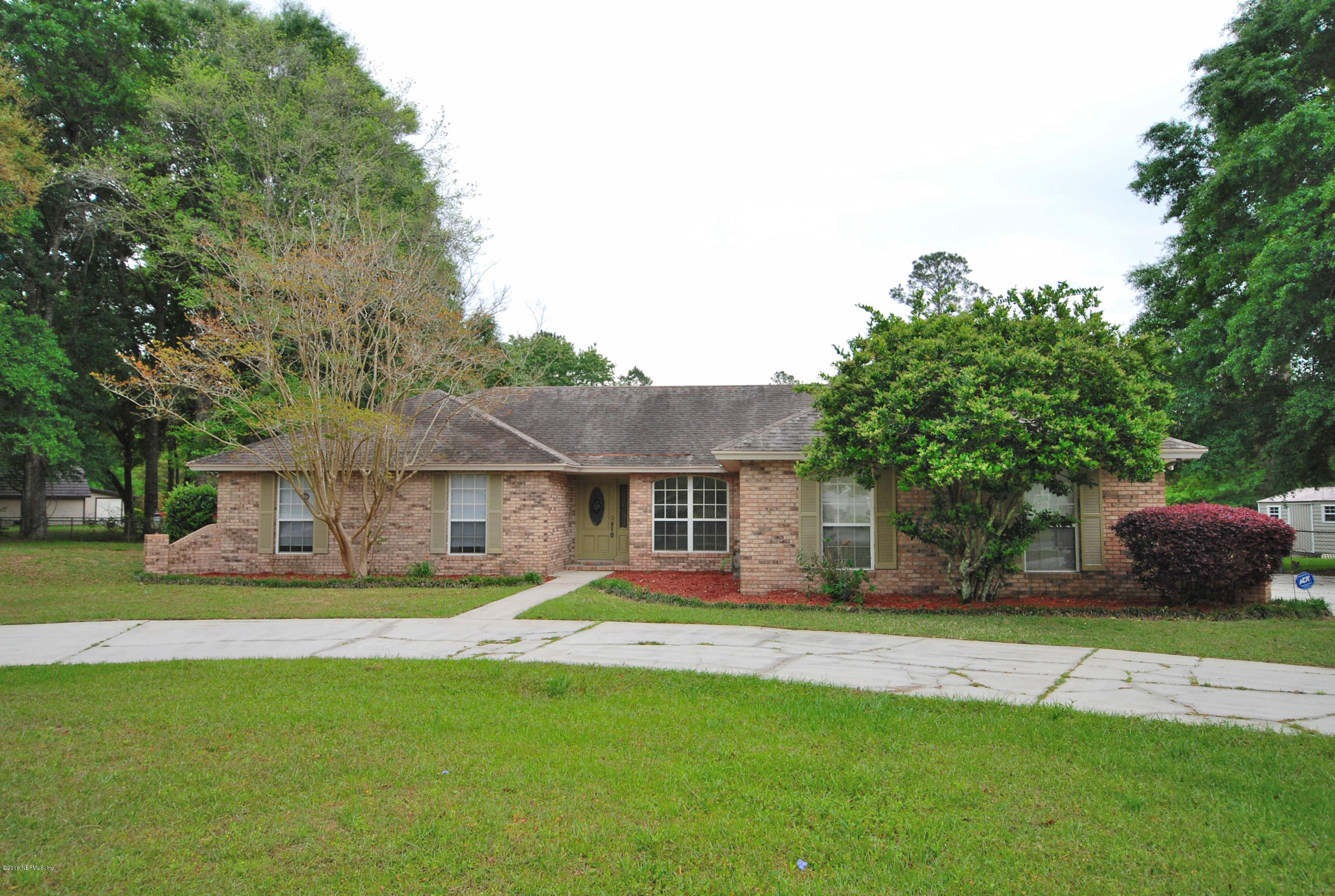 55581 Deer Run Road Callahan, FL 32011 - Photo 1 of 27 a front view of house with yard and green space