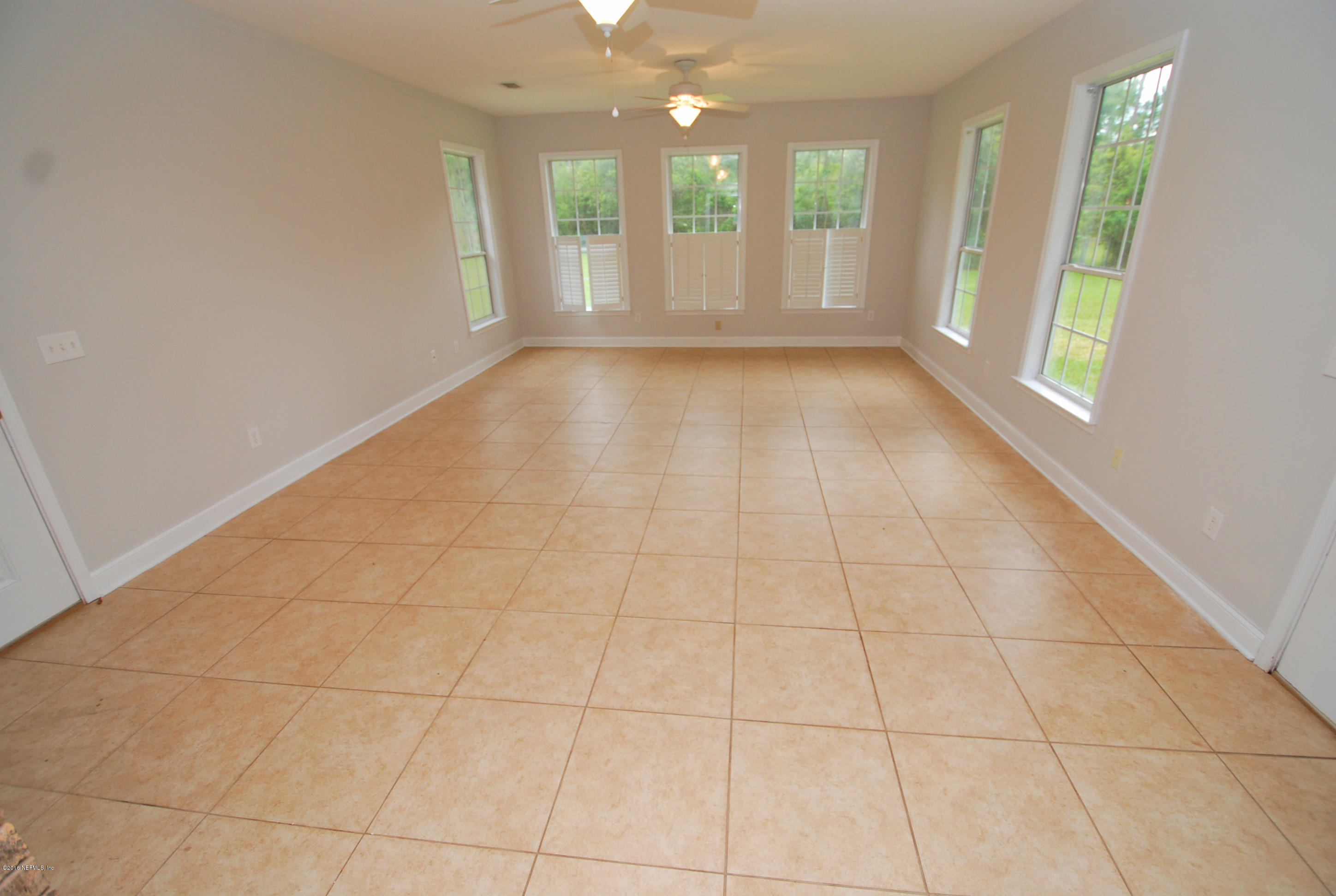 55581 Deer Run Road Callahan, FL 32011 - Photo 11 of 27 a view of an empty room with a window