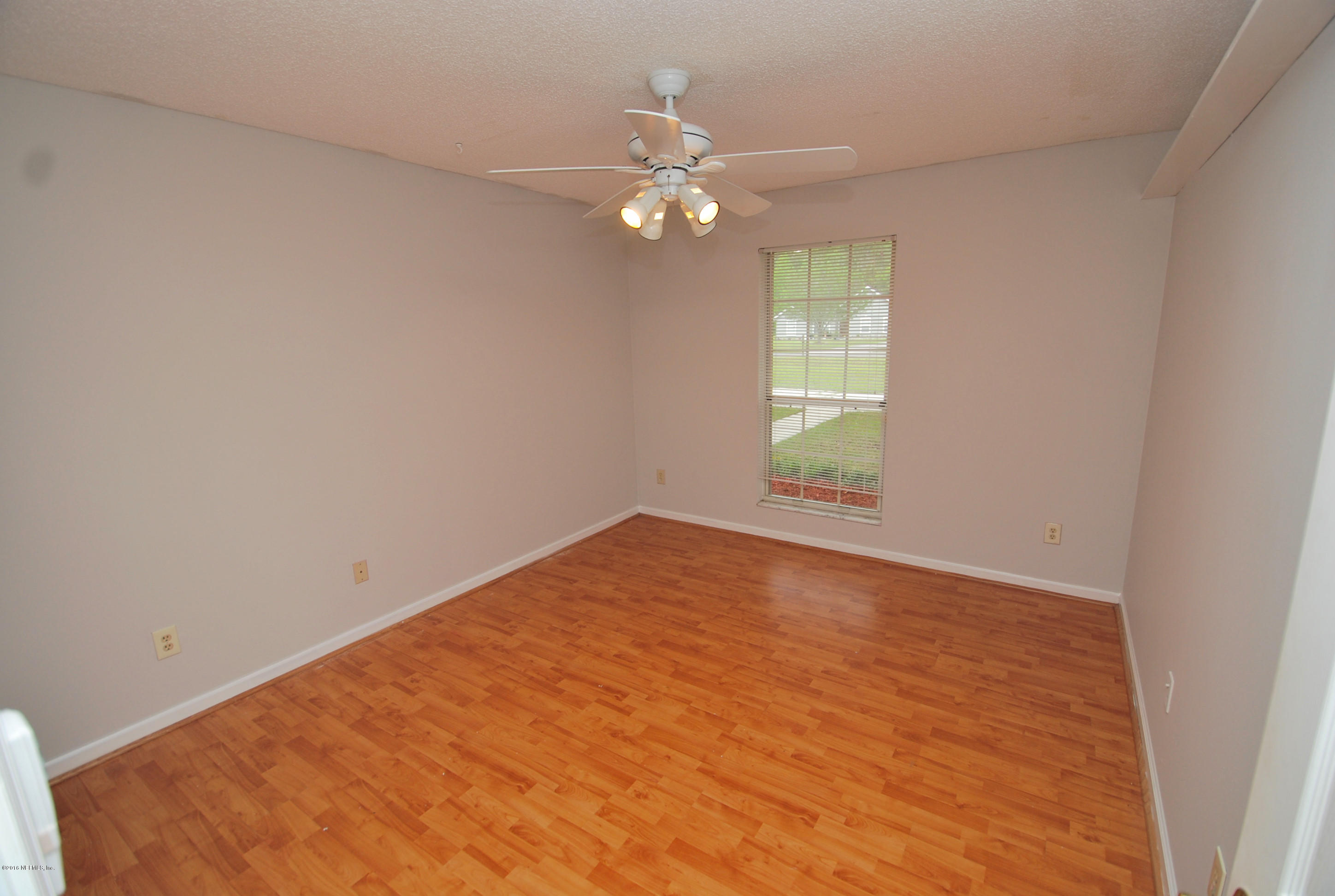 55581 Deer Run Road Callahan, FL 32011 - Photo 17 of 27 a view of an empty room with a window
