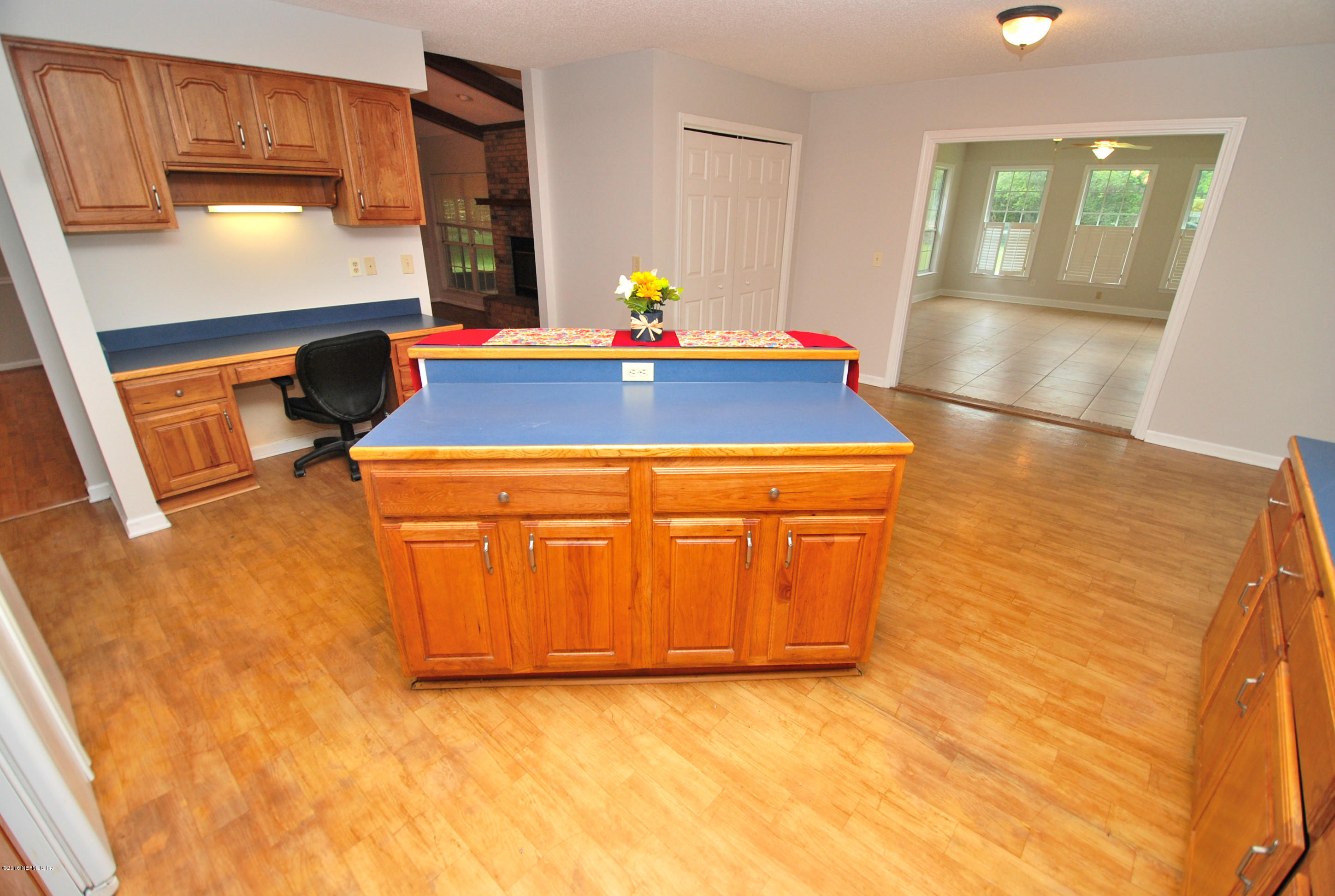 55581 Deer Run Road Callahan, FL 32011 - Photo 7 of 27 a room with a sink and a view of living room