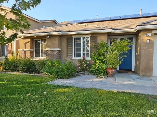 a view of a hallway with seating area