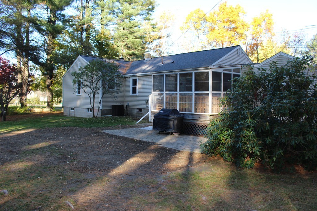 24 Garrison Road Chelmsford, MA 01824 - Photo 15 of 16 a house view with a garden space