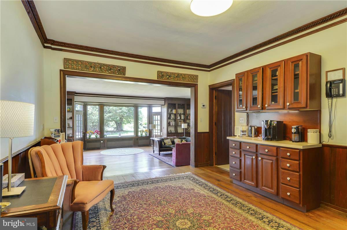 18505 Crossview Road Boyds, MD 20841 - Photo 3 of 30 a living room with furniture large window and wooden floor