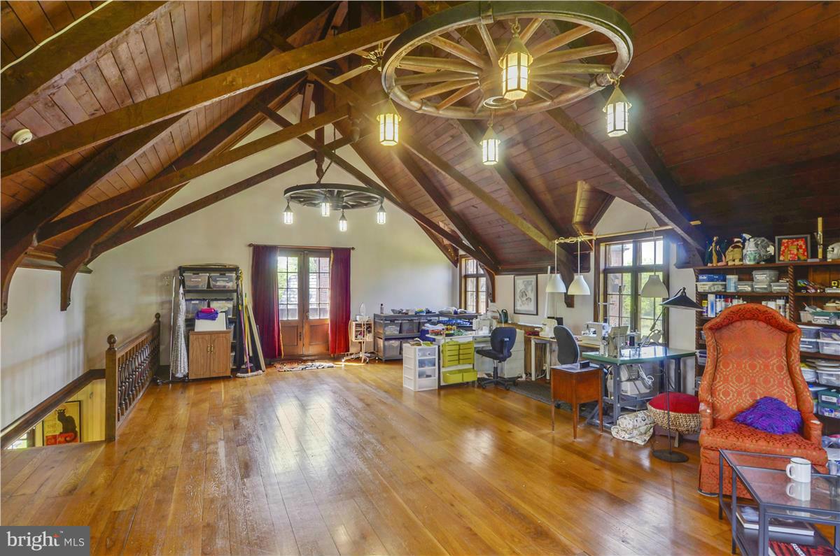 18505 Crossview Road Boyds, MD 20841 - Photo 28 of 30 a living room with lots of furniture and chandelier