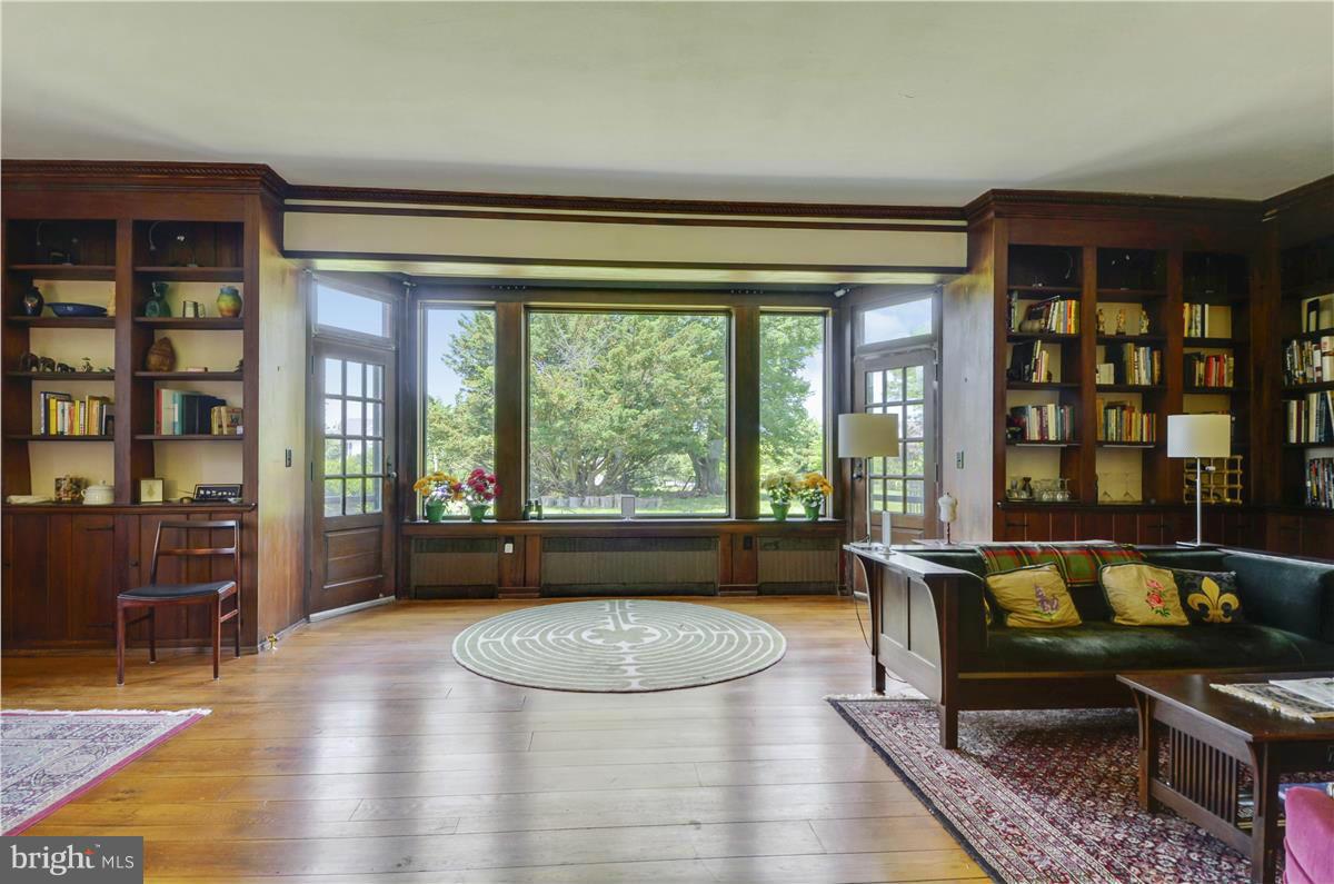 18505 Crossview Road Boyds, MD 20841 - Photo 4 of 30 a living room with furniture and a floor to ceiling window