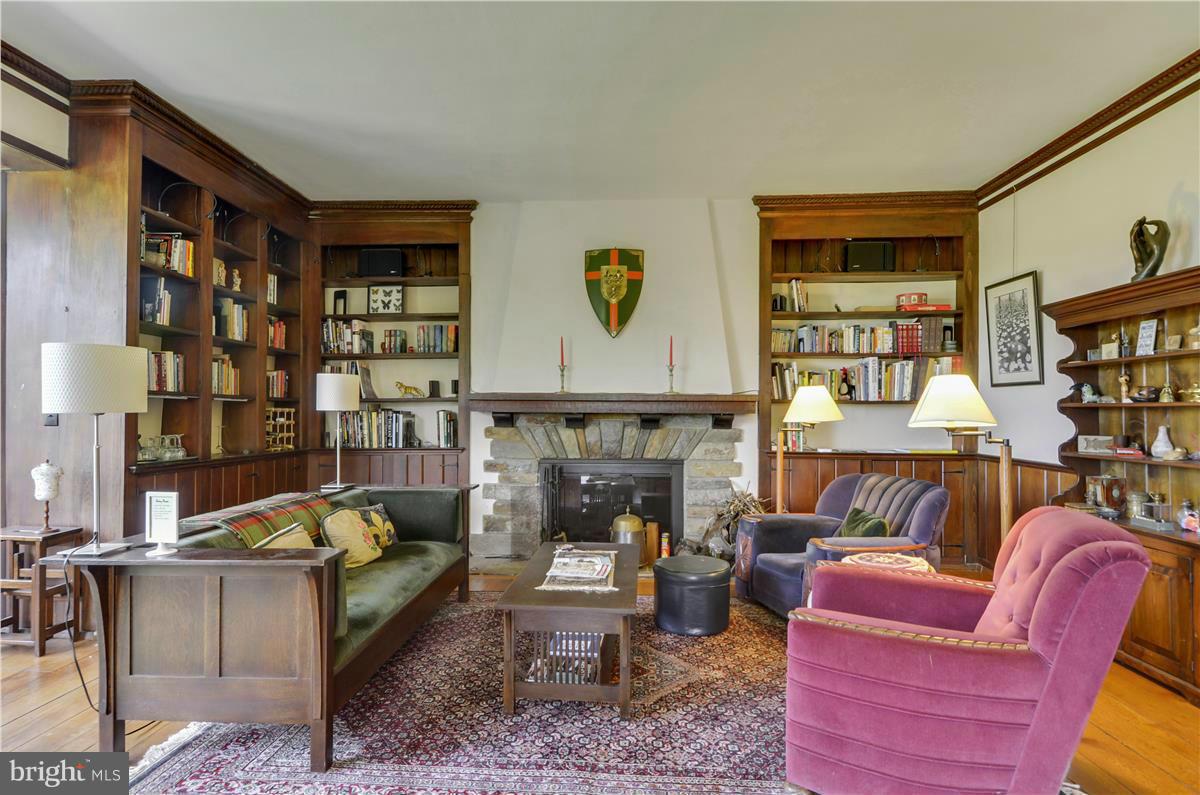 18505 Crossview Road Boyds, MD 20841 - Photo 6 of 30 a living room with furniture and a fireplace