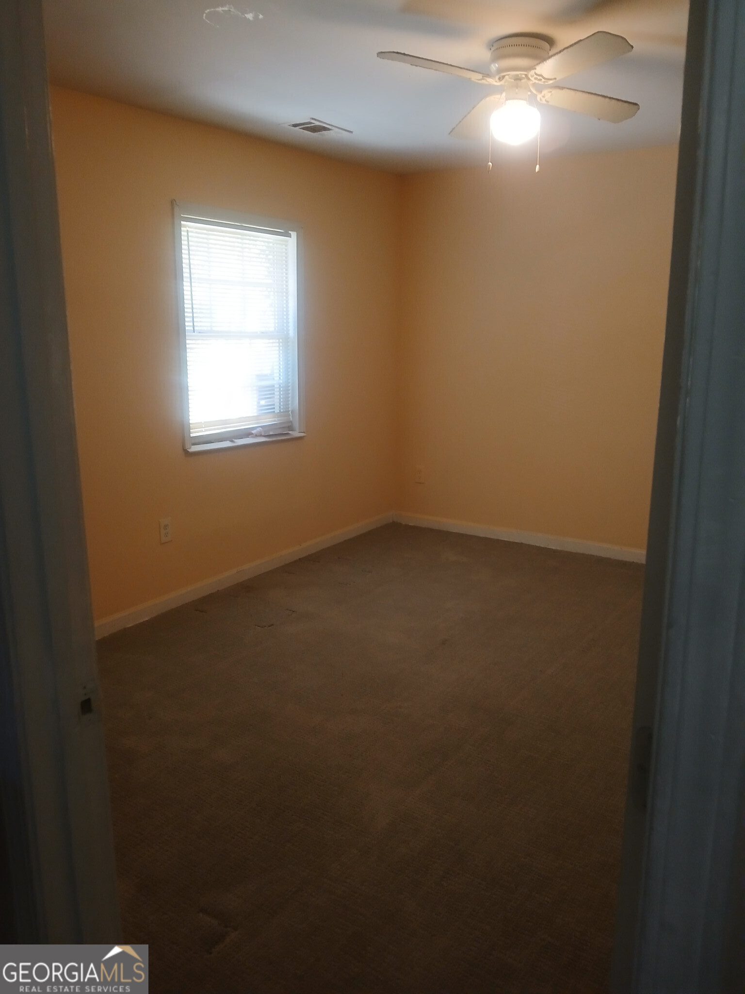 4526 Denise Drive Decatur, GA 30035 - Photo 12 of 18 an empty room with a window