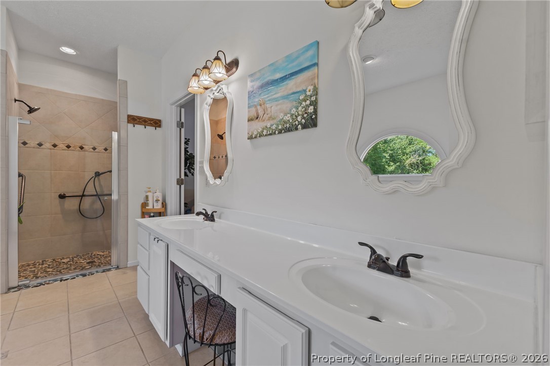 1096 Dean Road St. Pauls, NC 28384 - Photo 22 of 46 Spacious double vanity with make up area