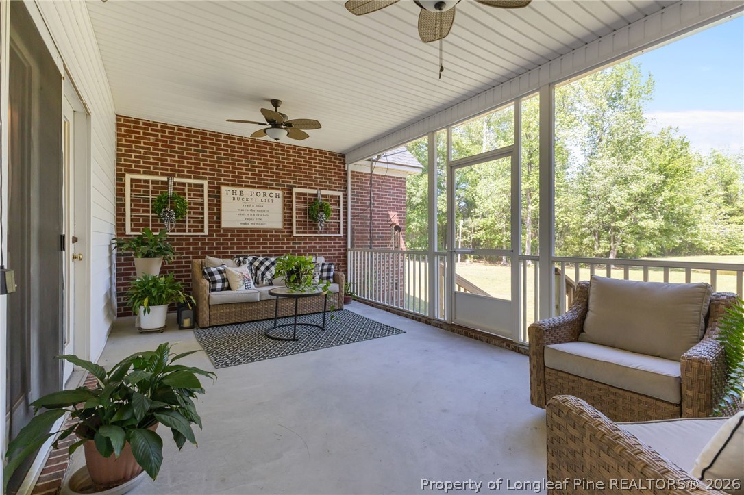 1096 Dean Road St. Pauls, NC 28384 - Photo 4 of 46 Relax on the screened porch