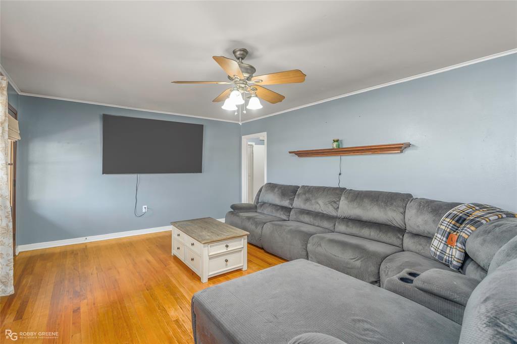 803 Drew Lane Minden, LA 71055 - Photo 5 of 33 a living room with furniture and a flat screen tv