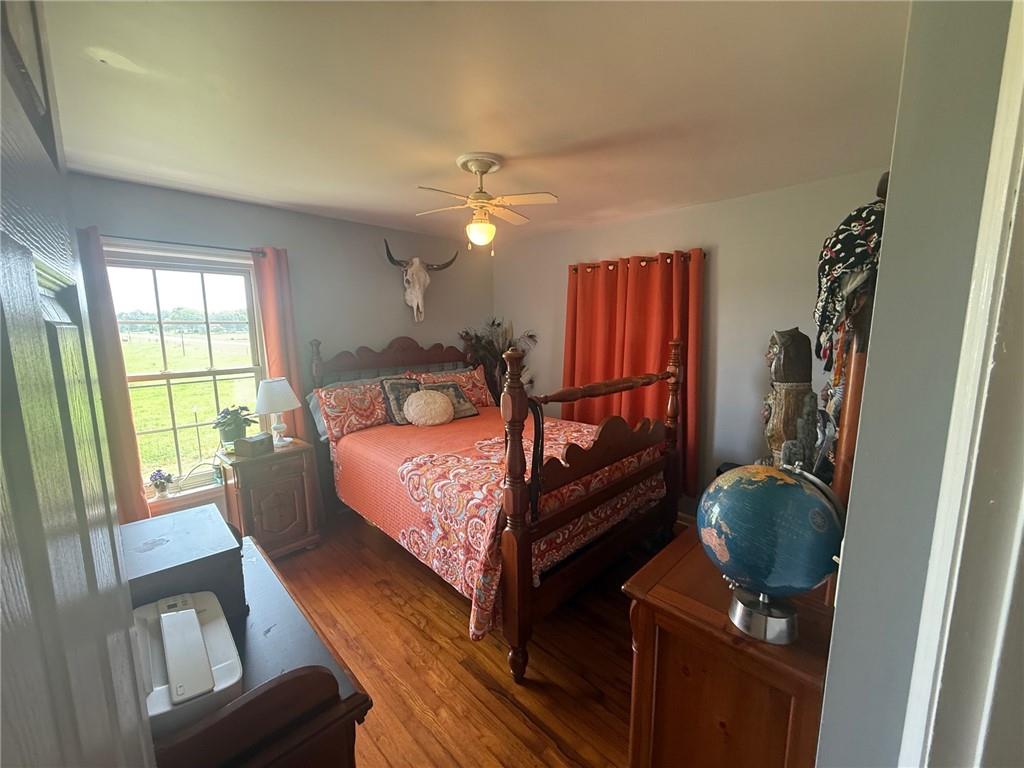 2705 Collard Valley Road Cedartown, GA 30125 - Photo 22 of 49 a bedroom with a bed and a mirror