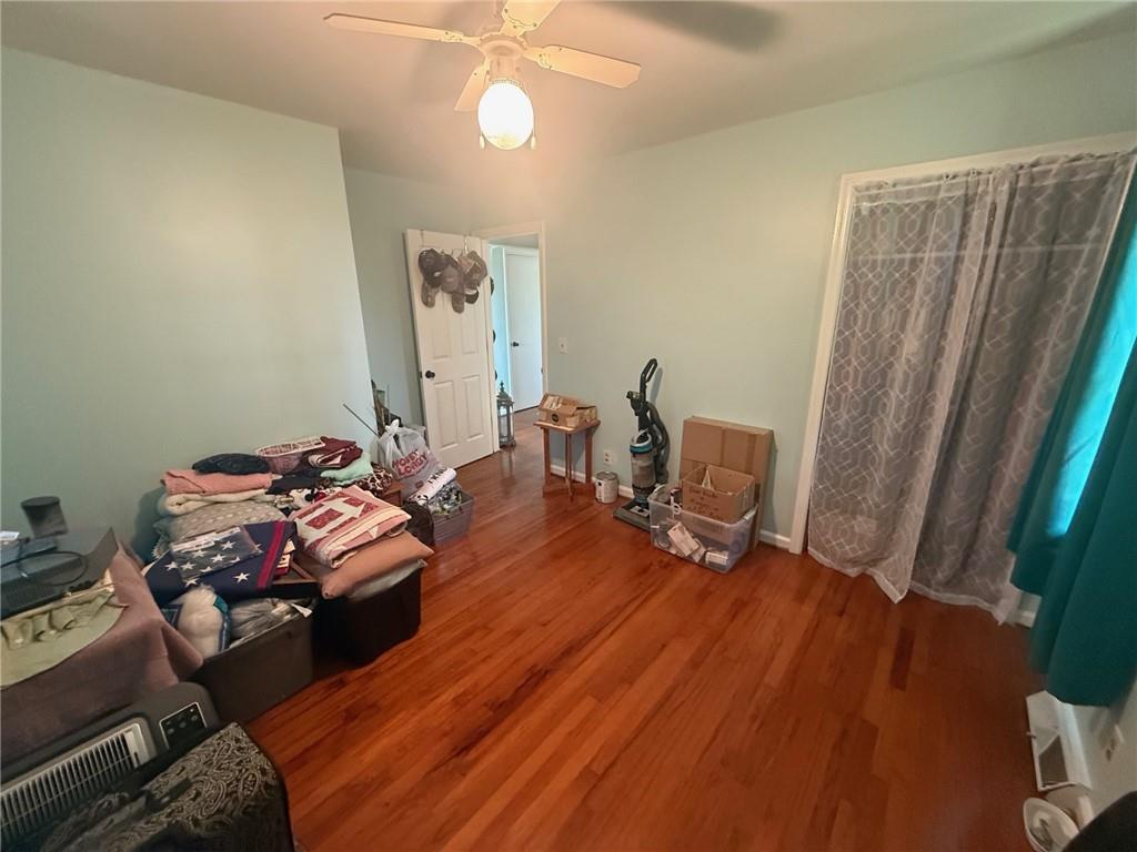 2705 Collard Valley Road Cedartown, GA 30125 - Photo 25 of 49 a bed room with a bed and a chair