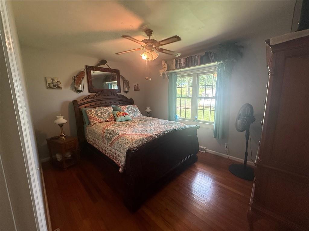 2705 Collard Valley Road Cedartown, GA 30125 - Photo 26 of 49 a bedroom with a bed and window